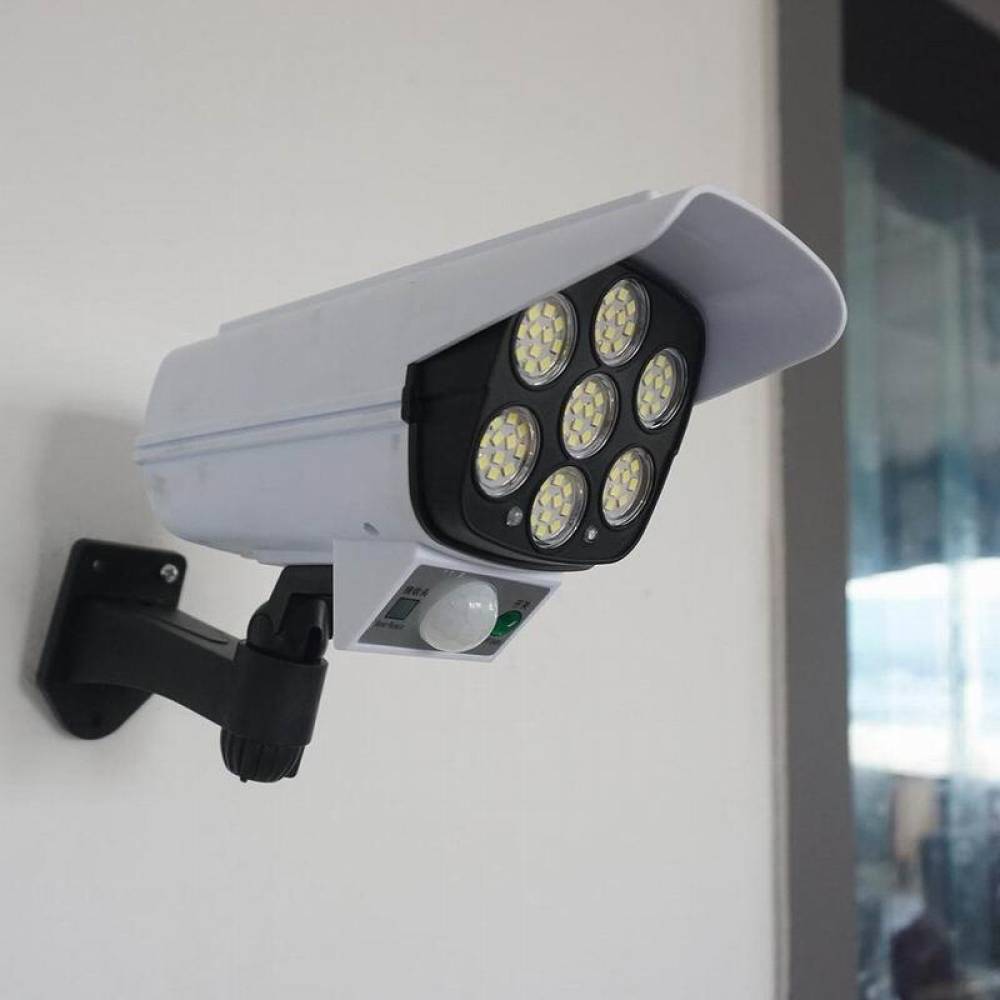 Lampa cu panou solar, 77 LED-uri, camera falsa, senzor de miscare, cu telecomanda, JD-2178T Lampa cu panou solar, 77 LED-uri, camera falsa, senzor de miscare, cu telecomanda, JD-2178T